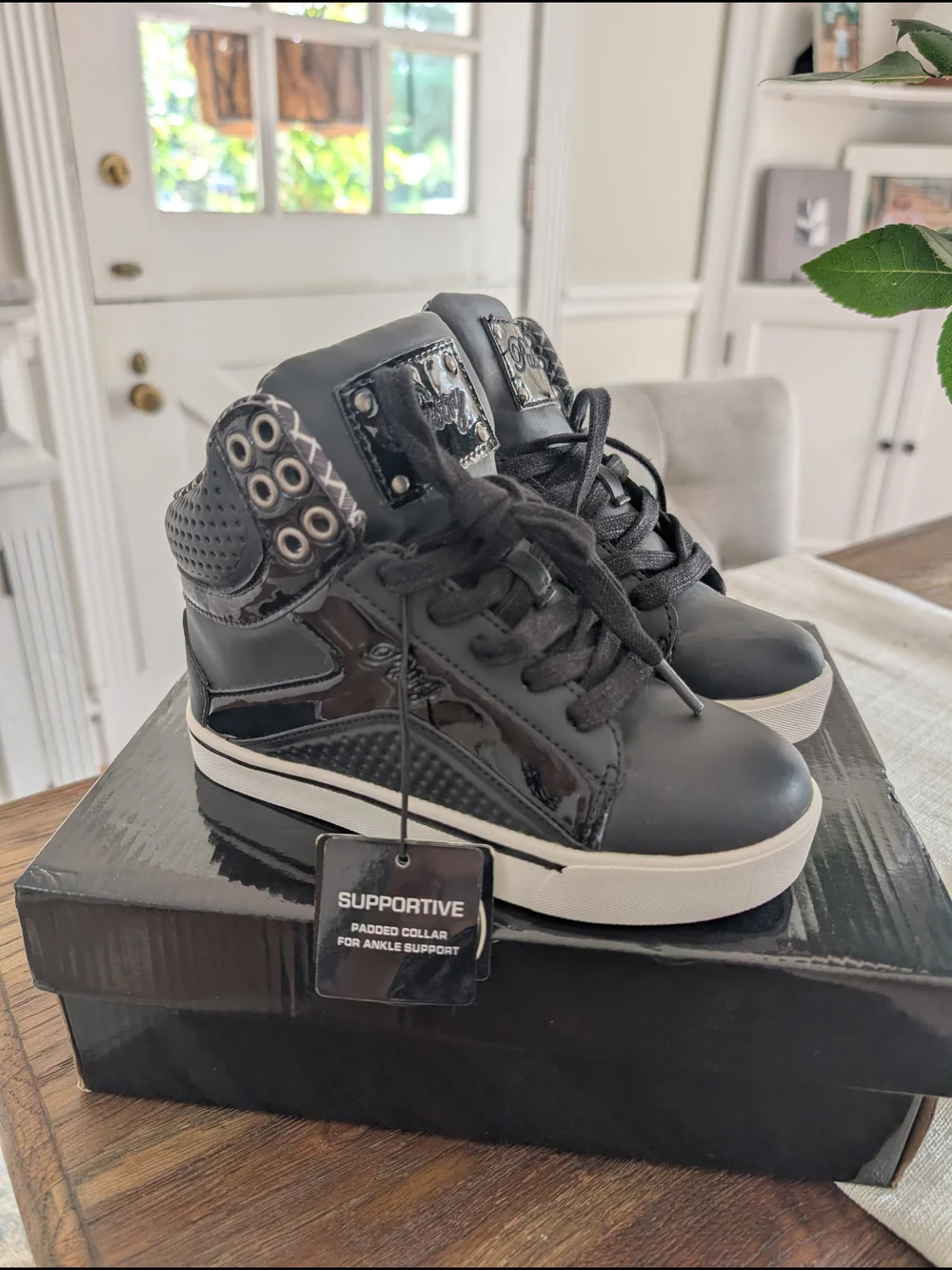 Black High-Top Sneakers with White Sole